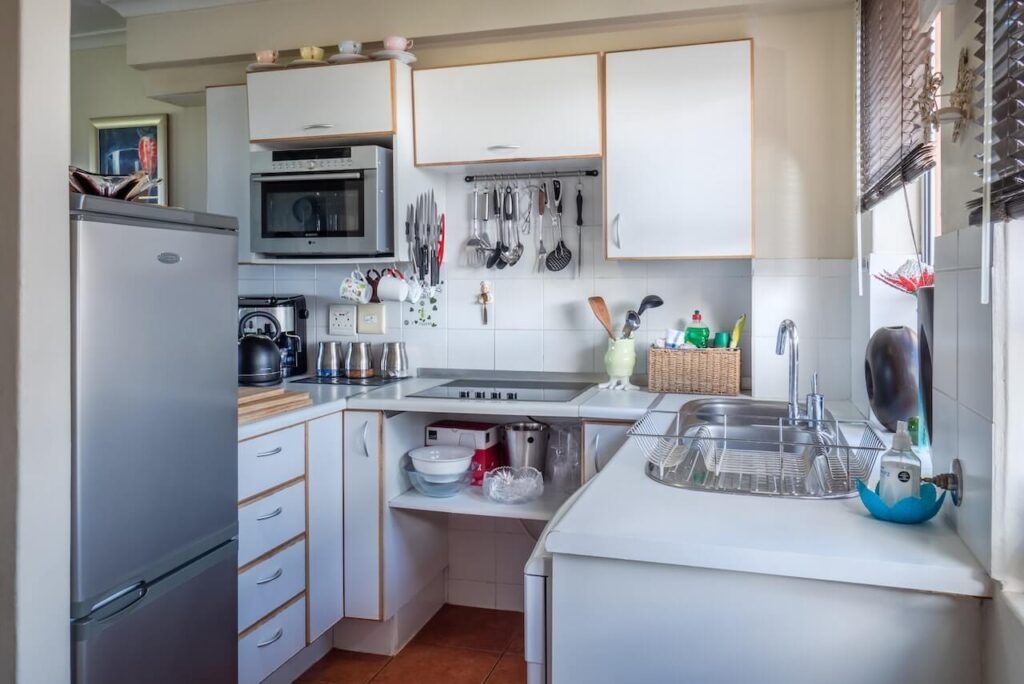 A kitchen with a family size fridge