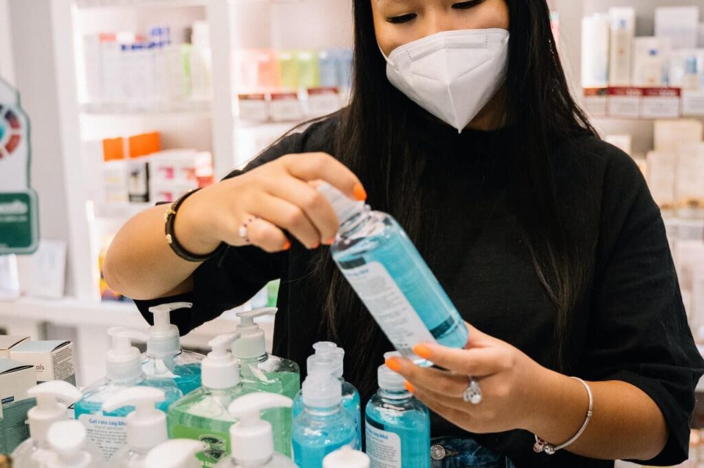 A woman checking lipo products in a store